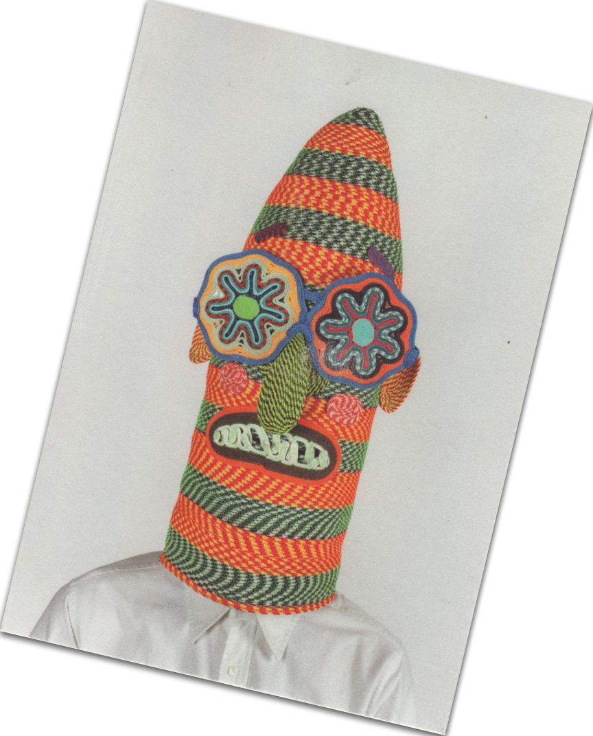 A decorative postcard featuring a person wearing a colourful knitted mask